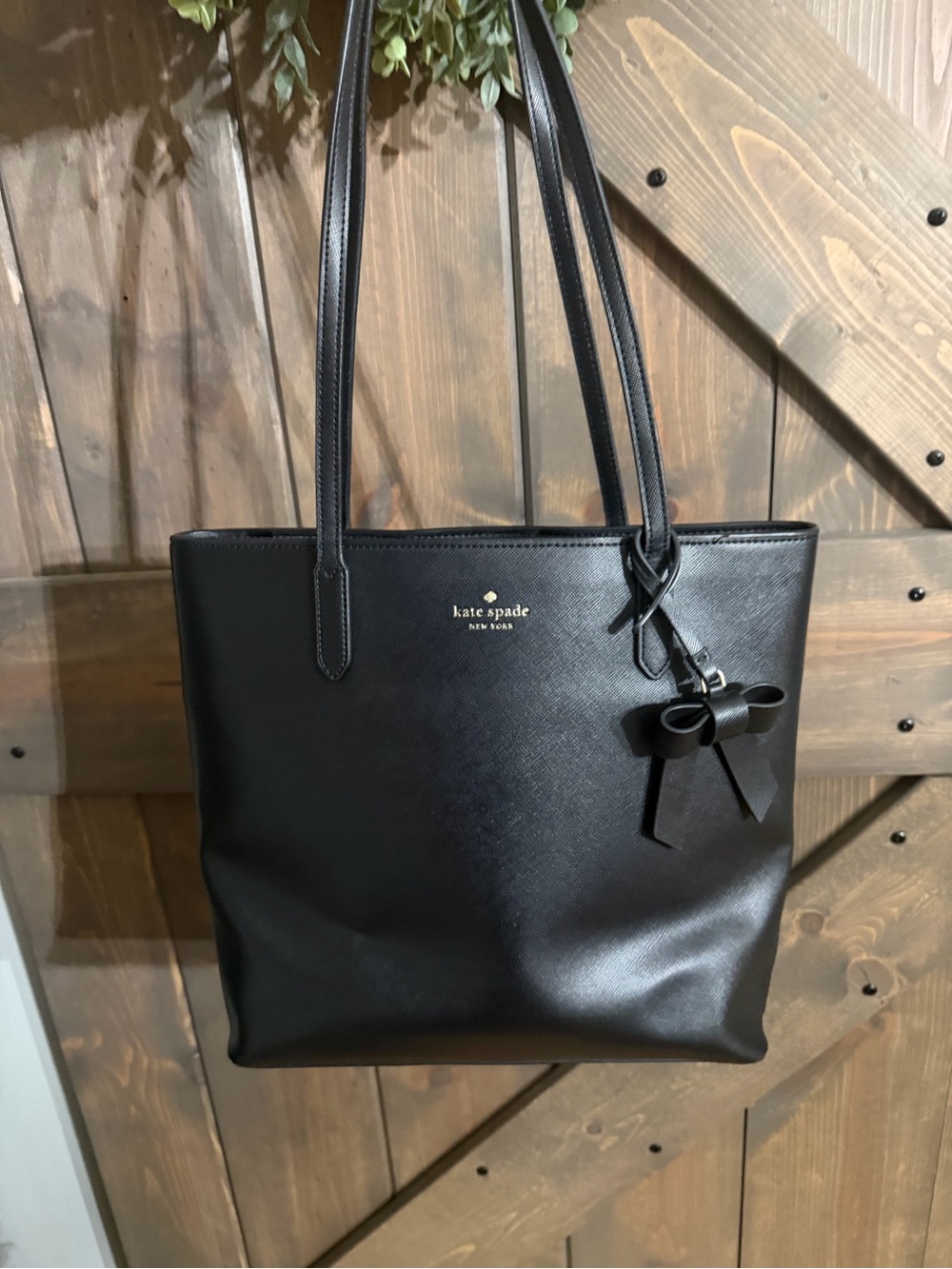 kate spade black leather tote with bow charm